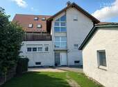 Hof mit Garage - Großzügiges Mehrfamilienhaus mit Garten, Garagen & Gewerbebereich, ausgebauter Dachboden