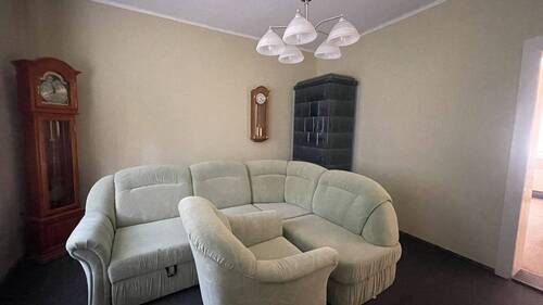 Wohnzimmer mit Kachelofen - 