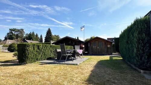 Gartensitzecke und Gartenhäuschen - Einfamilienhaus mit 73,00 m&sup2; in Lachendorf zum Kaufen