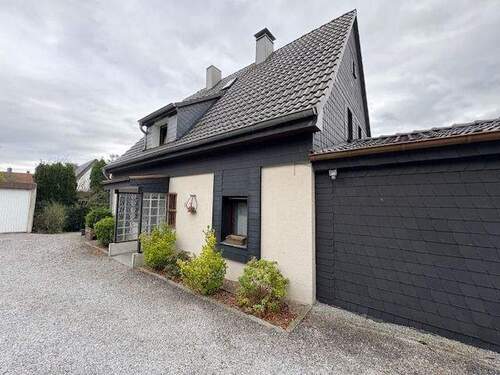 Ansicht - Freistehendes Einfamilienhaus zur Miete