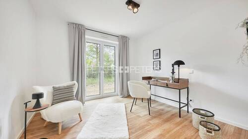 Zimmer Musterwohnung - 