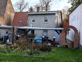 Gartenansicht Wohnhaus - 5 Zimmer Einfamilienhaus zum Kaufen in Sandersdorf