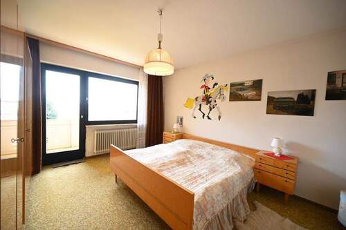 Schlafbereich mit Balkonzugang - 