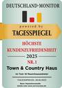 Siegel_Tagesspiegel_Hoechste-Kundenzufriedenheit_2025_Town-Country-Haus-scaled - 