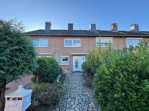 Herzlich Willkommen in Ihrem neuen Zuhause - Charmantes, vollunterkellertes Reihenmittelhaus mit Wintergarten in Neu Wulmstorf zu verkaufen