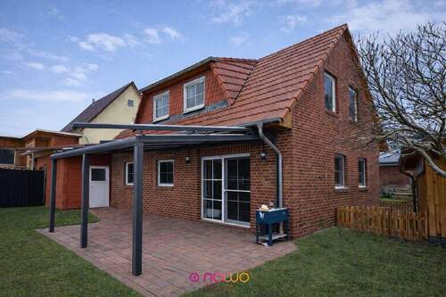 Ansicht Rückseite mit Terrasse - 4 Zimmer Einfamilienhaus zum Kaufen in Evessen