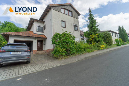 Bild 1 - Wohnoase für die ganze Familie: Frei stehendes Haus mit großem Garten und Wintergarten!