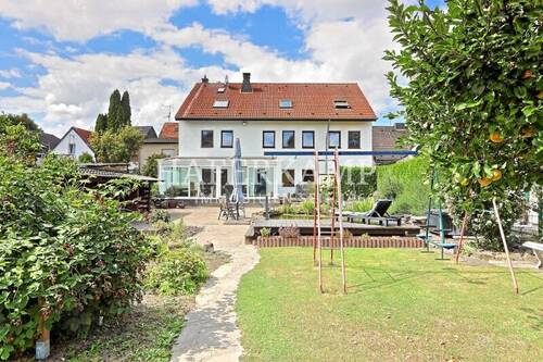 Gartenasicht - Zwei Häuser mit viel Platz und wunderschönem Garten - ideal für Mehrgenerationen