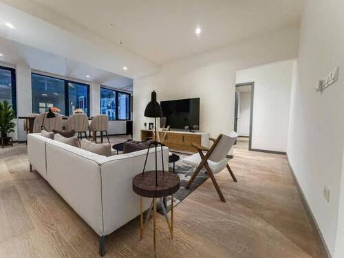 Wohnzimmer - Exklusives, barrierefreies Wohnen in bester Citylage - Erstbezug mit Aufzug & Einbauküche!
