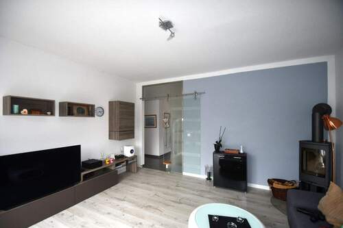 Wohnzimmer - Doppelhaushälfte mit 113,70 m² in Twistringen zum Kaufen