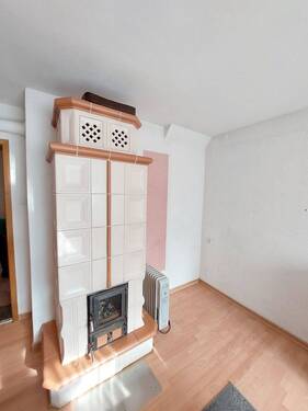 Wohnzimmer Ansicht 2 mit Ofen - 