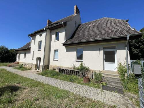 Rückansicht - Mehrfamilienhaus, Wohnhaus mit 308,00 m&sup2; in Oschersleben zum Kaufen