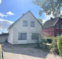 PURNHAGEN-IMMOBILIEN - Freistehendes Einfamilienhaus mit Garage in zentraler Lage von Bremen-Aumund! - Bremen / Aumund Schönebeck