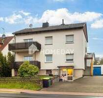 Einfamilienhaus mit zwei Wohnbereichen, großer Garage und BüroGewerbefläche - Schauenburg Elgershausen