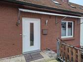 Eingang - Oberwohnung mit Dachterrasse im Zentrum von Barßel
