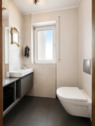 Gäste-WC - 2023 modernisiert und direkt von der Garderobe aus zugänglich 
- 