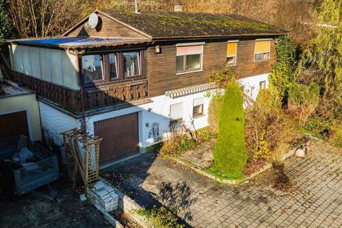 Ansicht 1 - Einfamilienhaus mit Garage - 178.000,00 EUR Kaufpreis, ca.  126,00 m² Wohnfläche