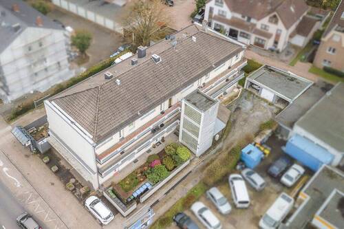 Titelbild - Modernisiertes Niedrigenergiehaus mit 11 Parteien, Garagen und Stellplätzen im Herzen von Kohlscheid