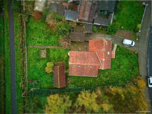 Ansicht übern Haus - 5 Zimmer Einfamilienhaus zum Kaufen in Bad Zwischenahn / Specken