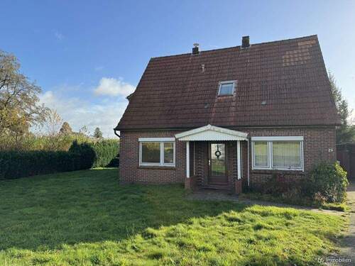 Ansicht Haus vorn - Einfamilienhaus mit 155,00 m&sup2; in Bad Zwischenahn / Specken zum Kaufen