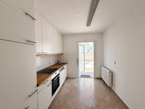 EG - Küchenbereich mit Übergang in den Wintergarten - 5 Zimmer Mehrfamilienhaus, Wohnhaus zum Kaufen in Münster