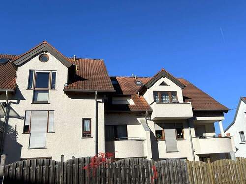 1_Außenansicht - Helle 3,5-Zimmer-Wohnung mit einem sonnigen Balkon, einem TG-Stellplatz und einer Einbauküche!