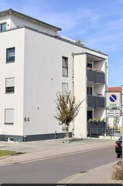 Außenansicht - Toplage Lu-Melm Wohnung mit Balkon und Stellplatz mit Wallbox