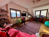 Zimmer im Dachgeschoss - 