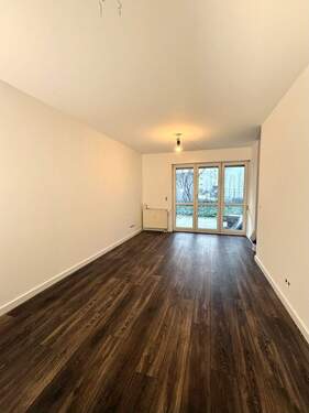 Wohnzimmer - 2 Zimmer Terrassenwohnung zum Kaufen in Berlin