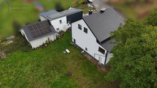 Außenansicht - Mehrfamilienhaus, Wohnhaus mit 305,00 m² in Kalbach zum Kaufen