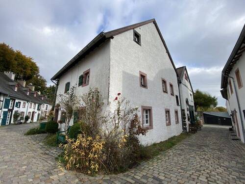 Seitenansicht - Einfamilienhaus mit 105,00 m&sup2; in Dahlem / Kronenburg zum Kaufen