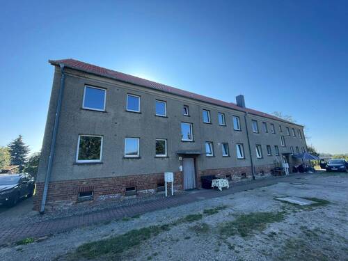 Hausansicht (Vorderseite) - Mehrfamilienhaus mit acht Wohnungen in Berge OT Muggerkuhl