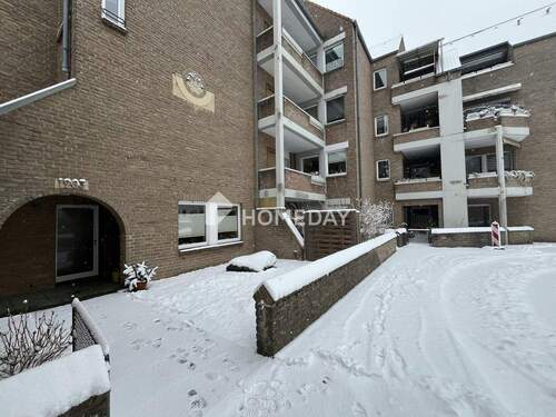 Außenansicht 3 - Zentral gelegenes Rundum-Sorglos-Paket: 3-Zimmer-EG-Wohnung mit Garten, Aufzug & Tiefgarage