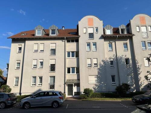 Titelbild - Charmante 2-Zimmer-Erdgeschosseigentumswohnung mit Terrasse, Gartenanteil und Tiefgaragenstellplatz in Leimen