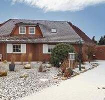 Solide Doppelhaushälfte mit viel Platz, Kaminbereich und großzügigem Garten - Landesbergen