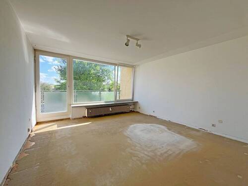 Schlafzimmer mit Zugang zum Balkon - Etagenwohnung mit 97,40 m² in München zum Kaufen