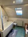 Badezimmer im Dachgeschoss - 