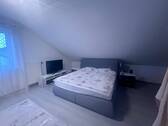 Schlafzimmer im Dachgeschoss - 