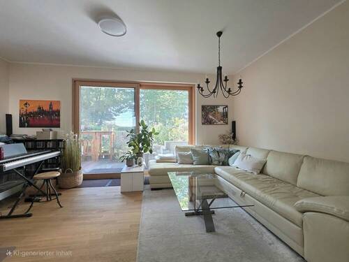 Wohnzimmer mit Blick auf Terrasse - 