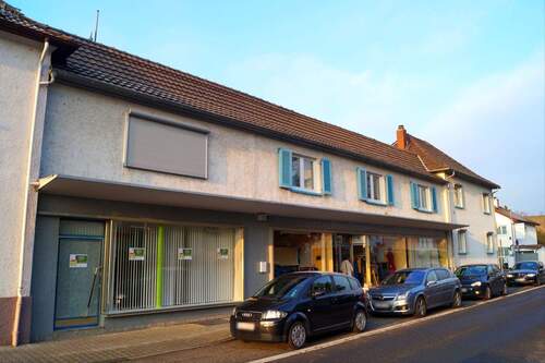 Ansicht - Haus, Wohnung und eine Ladenfläche