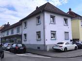 Ansicht 1 - 8 Zimmer Mehrfamilienhaus, Wohnhaus zum Kaufen in Raunheim