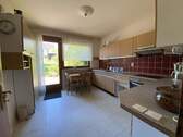 Küche mit Zugang zur Terrasse - 