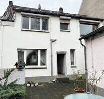 Einseitig-angebautes solides Ein-bis Zweifamilienhaus in Duisburg Alt-Homberg mit Garage