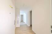 Eingangsbereich - Erstbezug: Moderne barrierefreie 3-Zimmer-Wohnung im Erdgeschoss mit Terrasse