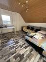 DG_02-Wohnzimmer.JPG - Etagenwohnung mit 63,00 m² in Morshausen zur Miete