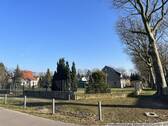 Grundstücksansicht von der Straßenecke - Grundstück in Neuenhagen zum Kaufen