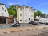 REMAX Immobilien DeLux Wohnung in Hausbach zu verkaufen - Stilvolle Erdgeschosswohnung mit gemütlicher Terrasse