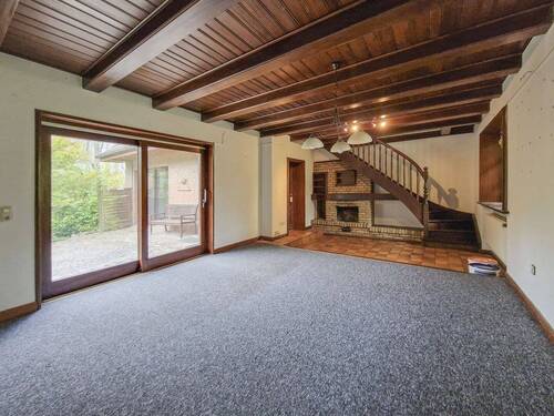 Wohnzimmer im Erdgeschoss - 4 Zimmer Einfamilienhaus zum Kaufen in Itzehoe