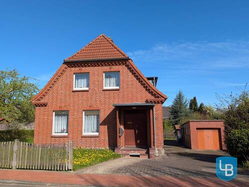Einfamilienhaus mit Garage - Charmantes Einfamilienhaus mit Entwicklungspotenzial in Kieler Randlage