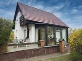 Giebelansicht WIntergarten - Ein-Zweifamilienhaus in Blumenholz